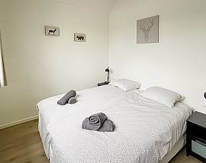 Sitzecke im Ferienhaus in Oosterwolde, mit Blick auf die Terrasse in den friesischen Wldern.