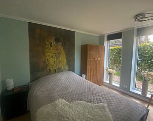 Lichte slaapkamer in Vakantiehuis in Boijl, geniet van de natuur in Friesland.