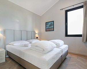 Comfortabele slaapkamer in de Vrijstaande woning in Oudehaske, gelegen op het Friese platteland.