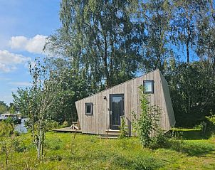 Charmant vakantiehuisje in Westergeest met uitzicht op de natuur van het Friese platteland.