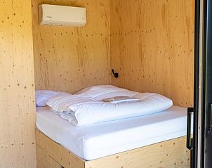 Comfortabele slaapkamer in Vakantiehuisje in Scherpenzeel, Friesland.