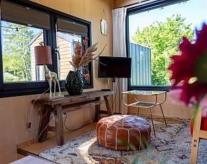 Stijlvolle woonkamer in Huisje in Scherpenzeel, vakantiehuis in Friesland.