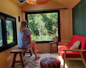 Uitzicht vanuit de woonkamer van Huisje in Scherpenzeel, Friesland.