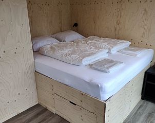 Comfortabele slaapkamer in Vakantiehuis in Scherpenzeel, voor een goede nachtrust in Friesland.