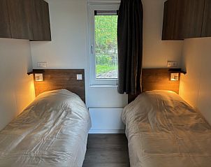 Eetruimte in vakantiehuis FR429, Blesdijke, Het Friese platteland, Friesland. Comfortabel interieur voor gezellige maaltijden.