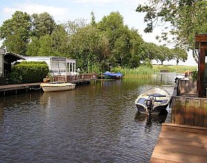 Verblijf 2612005 - Vakantiewoning Het Friese platteland - Luxe chalet 55 aan het water in Bantega met sloep 8 pax