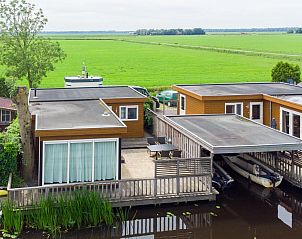 Uitzicht op het Friese platteland nabij Sluisje 55 chalet in Bantega, Friesland.