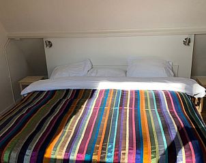 Comfortabele slaapkamer in Vakantiehuis in Munnekeburen, Friesland.