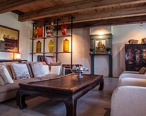 Charmante buitenkant van Vakantiehuis in Drogeham, gelegen op het Friese platteland.