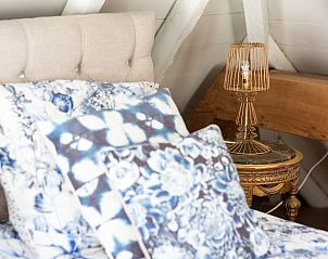 Detail van slaapkamer in Huisje in Drogeham, vakantiehuis op het Friese platteland.