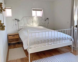 Gezellige woonkamer van vakantiehuis FR424 in Longa, Friesland met comfortabele zithoek.