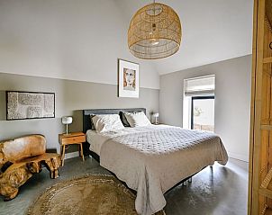 Slaapkamer in Huisje in Wytgaard, vakantiehuis in Friesland met comfortabele inrichting.