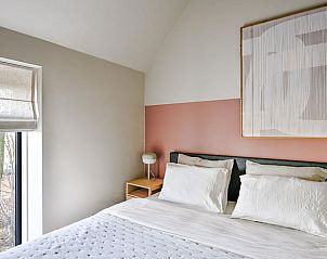 Knusse slaapkamer in Huisje in Wytgaard, vakantiehuis in Friesland voor een ontspannen verblijf.