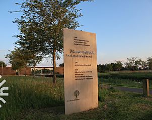 Gezellige houtkachel in woonkamer van FR411 vakantiehuis, Oudeschoot.