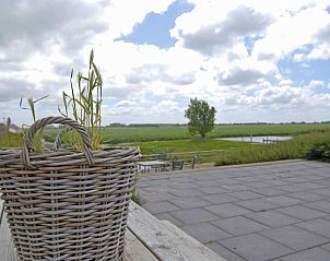 Gezellige slaapkamer onder het dak in vakantiehuis FR290, Sint Annaparochie, Friesland.