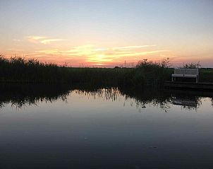 Grote eetruimte in vakantiehuis FR290, Sint Annaparochie, Friesland met veel zitplaatsen.
