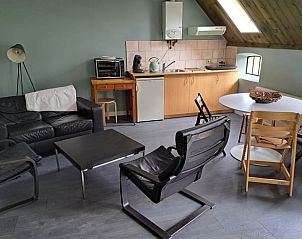 Open keuken en zithoek in Huisje in Wommels, vakantiehuis in Friesland.