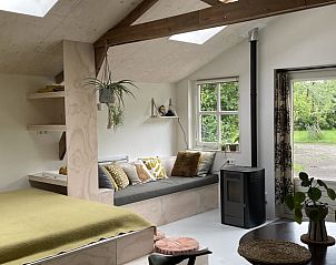 Gezellige zithoek in Vakantiehuis in De Tike, ideaal voor een rustige vakantie in Friesland.