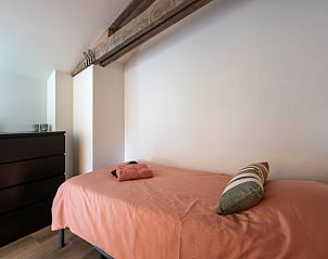 Slaapkamer met eenpersoonsbed in Vakantiehuisje in Pingjum, Het Friese platteland, Friesland.