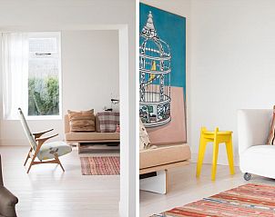 Stijlvolle binnenruimte van Vakantiehuisje in Pingjum met kunstwerken en kleurrijke meubels.