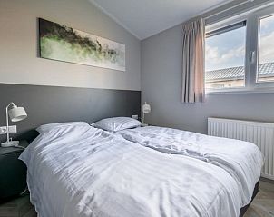 Comfortabele slaapkamer in Vakantiehuis Hackfort 6 in Kerkdriel, ideaal voor een ontspannen verblijf.