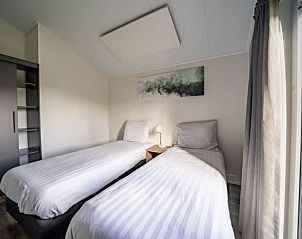 Moderne keuken en eetruimte in Vakantiehuis Hackfort 6, gelegen in het Rivierengebied van Gelderland.