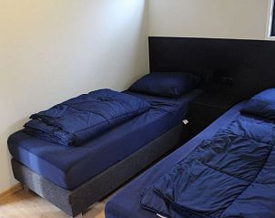 Twee eenpersoonsbedden in Vakantiehuis Just Nature 6, Rivierengebied, Gelderland.