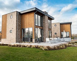 Luxe terras met zitgedeelte bij Vakantiehuis Pavilion l'etage 10, Kerkdriel, Gelderland.