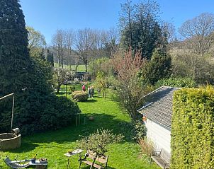 Ruime tuin bij Vakantiehuis in Beek-Ubbergen, ideaal voor ontspanning.