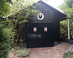 Charmante houten gevel van Vakantiehuis in Beek-Ubbergen, Gelderland.