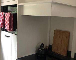 Vakantiehuisje in Buren, stijlvolle keuken met apparatuur in Rivierengebied, Gelderland.