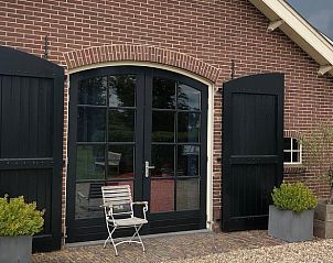 Vakantiehuisje in Buren, charmante ingang met terras in het Rivierengebied van Gelderland.