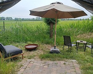 Terras met uitzicht bij Huisje in Eck en Wiel, vakantiehuis in Rivierengebied, Gelderland.