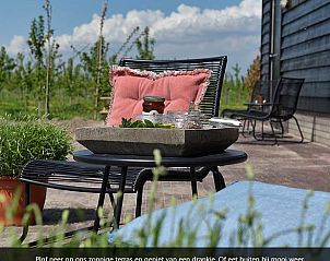Gezellige keuken in Huisje in Zoelen, vakantiehuis in het Rivierengebied van Gelderland, met moderne apparatuur en landelijke charme.