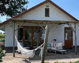 Gemtliches Wohnzimmer des Ferienhauses in Kesteren, Gelderland, mit stilvoller Einrichtung und warmer Atmosphre im Rivierengebied.