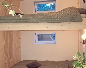 Knusse slaapkamer met stapelbed in Vakantiehuisje in Winssen, Rivierengebied.