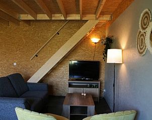 Comfortabele zithoek in Vakantiehuis in Herveld, gezellige vakantiewoning in Rivierengebied, Gelderland.