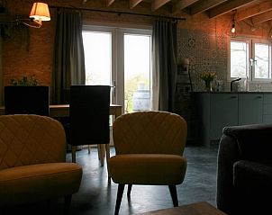 Eetruimte en keuken in Vakantiehuis in Herveld, moderne vakantiewoning in Rivierengebied, Gelderland.