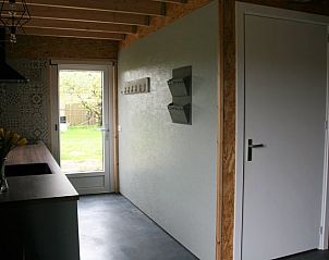 Ingang met veel licht in Vakantiehuis in Herveld, uitnodigende vakantiewoning in Rivierengebied, Gelderland.