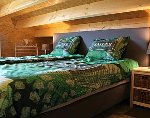 Ruime slaapkamer in Vakantiehuis in Herveld, comfortabele vakantiewoning in Rivierengebied, Gelderland.