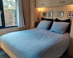 Sfeervolle slaapkamer in Vakantiehuisje in Wolfheze, Rivierengebied, Gelderland.
