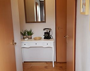 Stijlvolle hal van vakantiehuis in Wolfheze, perfect voor een ontspannen verblijf in Gelderland.