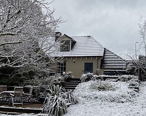 Comfortabel bed in Vakantiehuisje in Dreumel, ideaal voor een goede nachtrust.