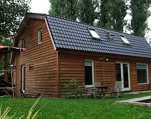 Gezellig terras bij Huisje in Dreumel, vakantiehuis in Rivierengebied Gelderland, perfect voor ontspanning.