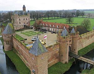 Gezellige slaapkamer met tweepersoonsbed in vakantiehuis DG1294, Gelderland.