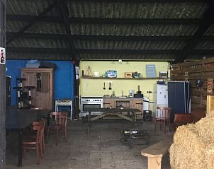 Sfeervolle eetruimte in Vakantiehuisje in Toldijk, gezellige plek in Rivierengebied, Gelderland.