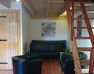 Knusse zithoek in Vakantiehuis in Toldijk, ideaal voor ontspanning in het Rivierengebied.