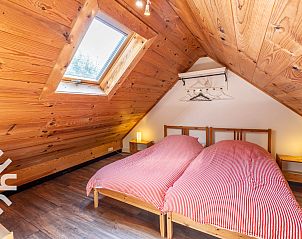 Vooraanzicht van vakantiehuis DG1743 in Toldijk, Gelderland met karakteristieke architectuur.