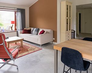 Comfortabele woonkamer in Huisje in Heesselt, vakantiehuis in Rivierengebied.