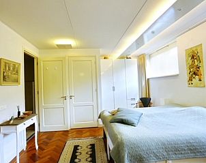 Comfortabele slaapkamer in Vakantiehuis in Angerlo, Gelderland met moderne inrichting.